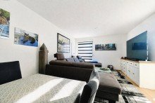 Wohnzimmer 3-Zimmer-Maisonette- Wohnung in Gro�-Zimmern mit TG-Stellplatz.