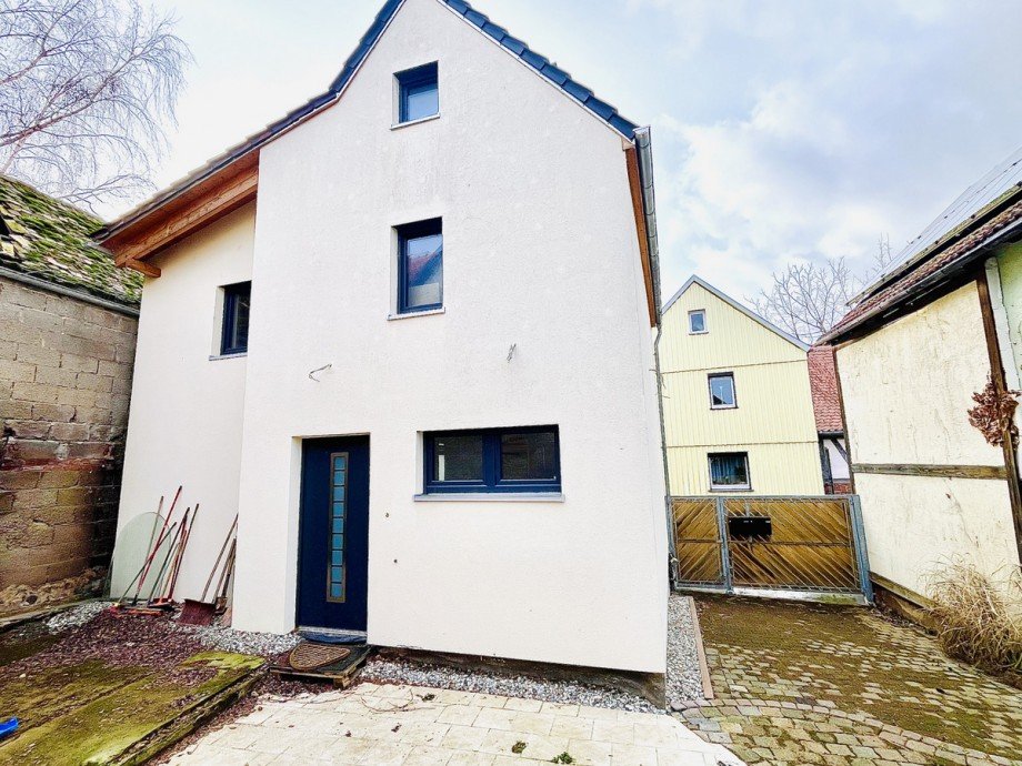 R�ckseite mit Eingang Einfamilienhaus Otzberg/Habitzheim
