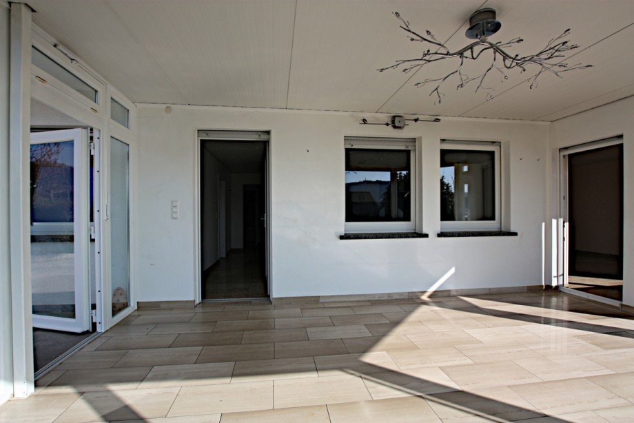 Wintergarten mit Eingang Erdgeschosswohnung Breuberg