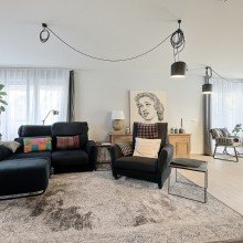 Wohnzimmer Eigenes Haus. Maximale Freiheit. Kein Gartenaufwand.